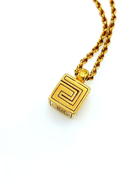 givenchy mens gold pendants|Givenchy men's jewelry.